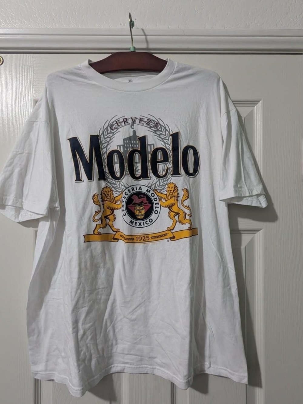 Ripple Junction White Short Sleeve Tee with Black and Gold Modelo Crest